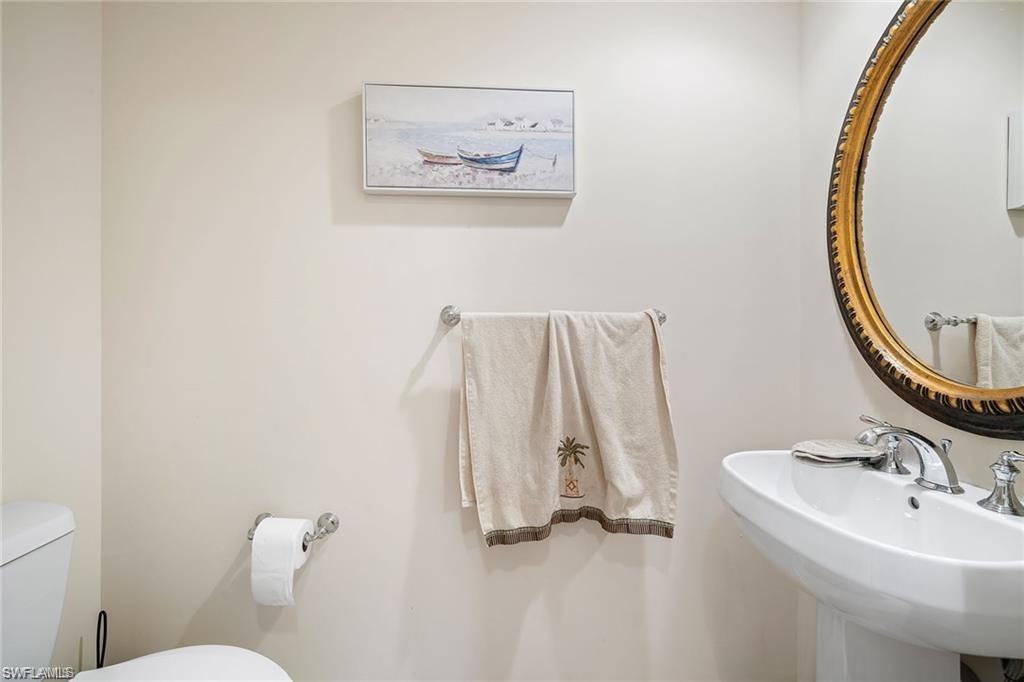 1065 Borghese Lane, Unit 203 Naples, FL 34114 - Photo 17 of 28 Powder Room