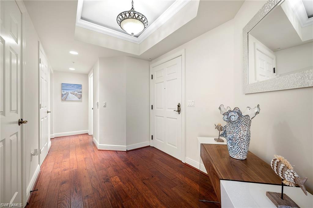 1065 Borghese Lane, Unit 203 Naples, FL 34114 - Photo 3 of 28 ENTRY WITH TRAY CEILING