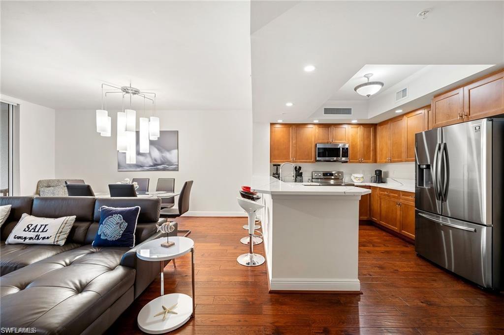 1065 Borghese Lane, Unit 203 Naples, FL 34114 - Photo 6 of 28 WELL EQUPPED KITCHEN