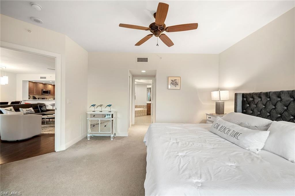 1065 Borghese Lane, Unit 203 Naples, FL 34114 - Photo 10 of 28 PRIMARY SUITE