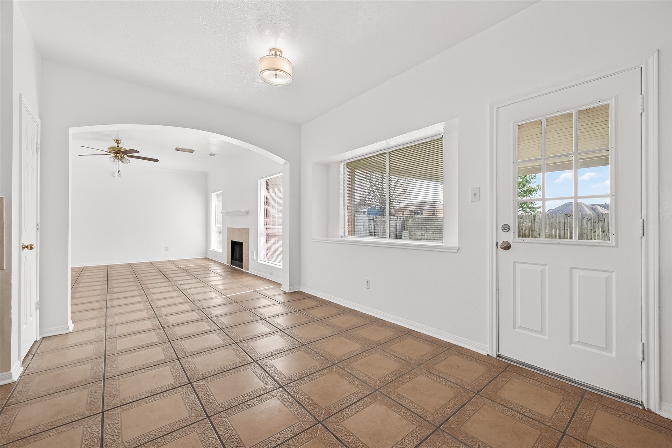 18807 Forest Deer Road Houston, TX 77084 - Photo 11 of 29 a view of an empty room with window and cabinet
