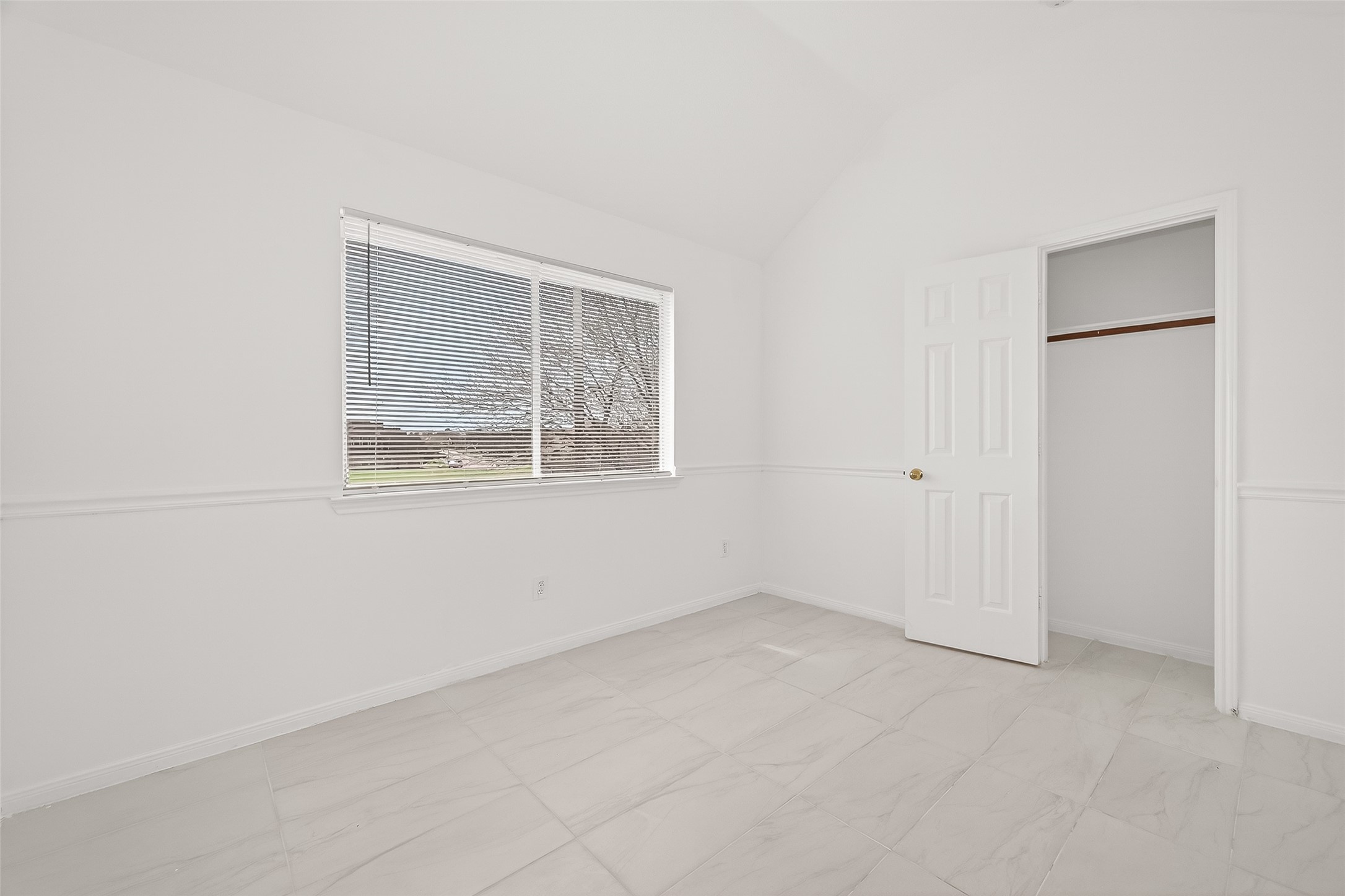 18807 Forest Deer Road Houston, TX 77084 - Photo 20 of 29 an empty room with a window