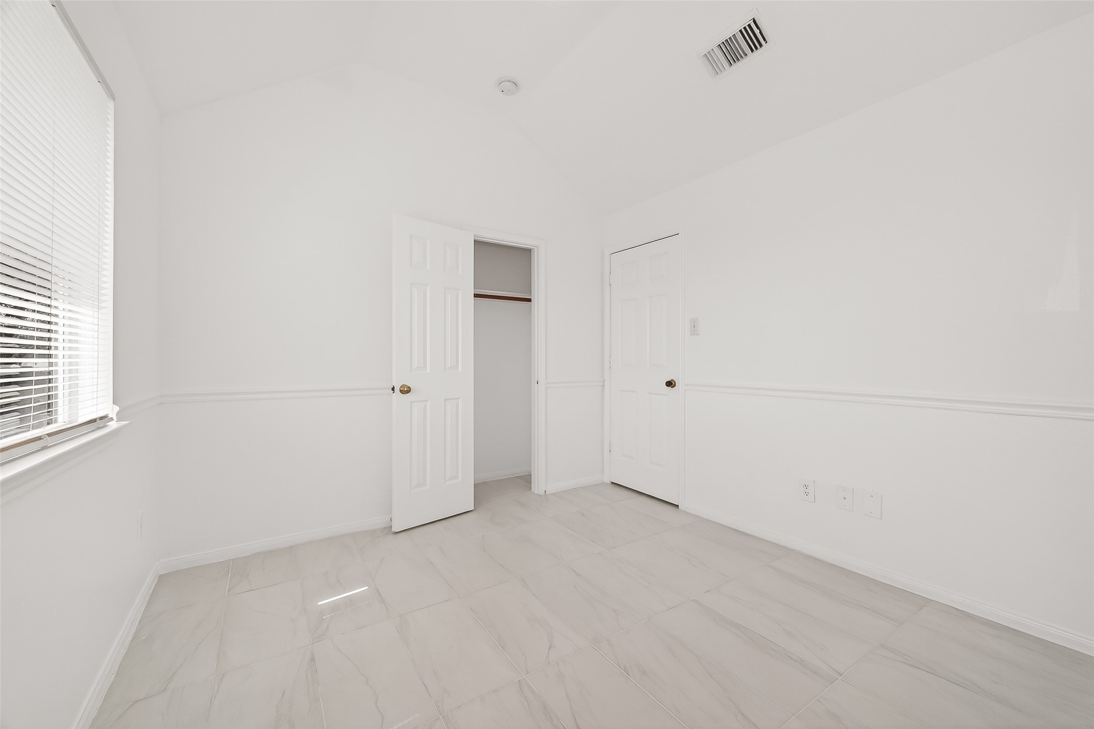 18807 Forest Deer Road Houston, TX 77084 - Photo 21 of 29 an empty room with white walls