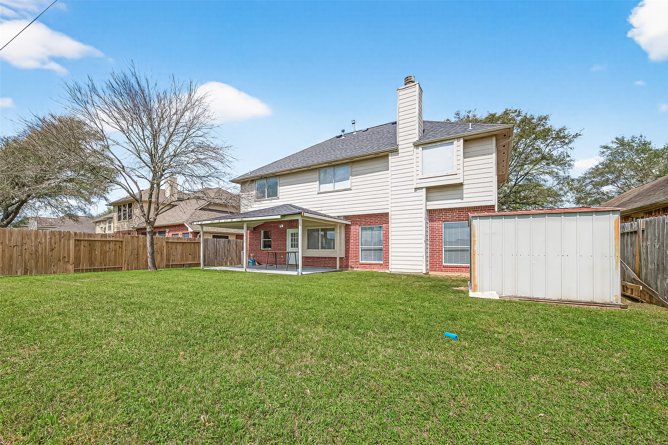 18807 Forest Deer Road Houston, TX 77084 - Photo 26 of 29 a front view of house with yard and trees