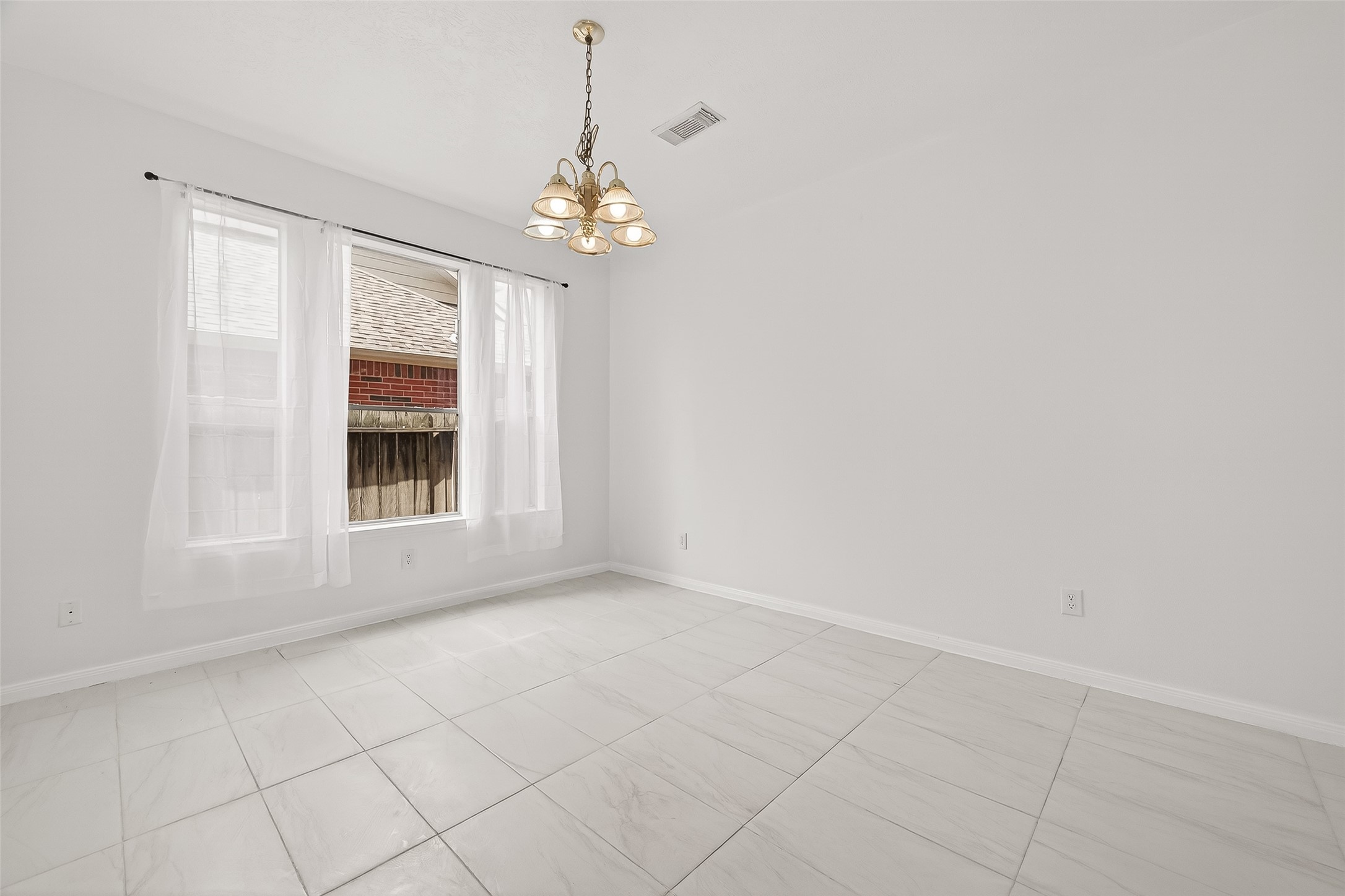 18807 Forest Deer Road Houston, TX 77084 - Photo 8 of 29 a view of livingroom with chandelier