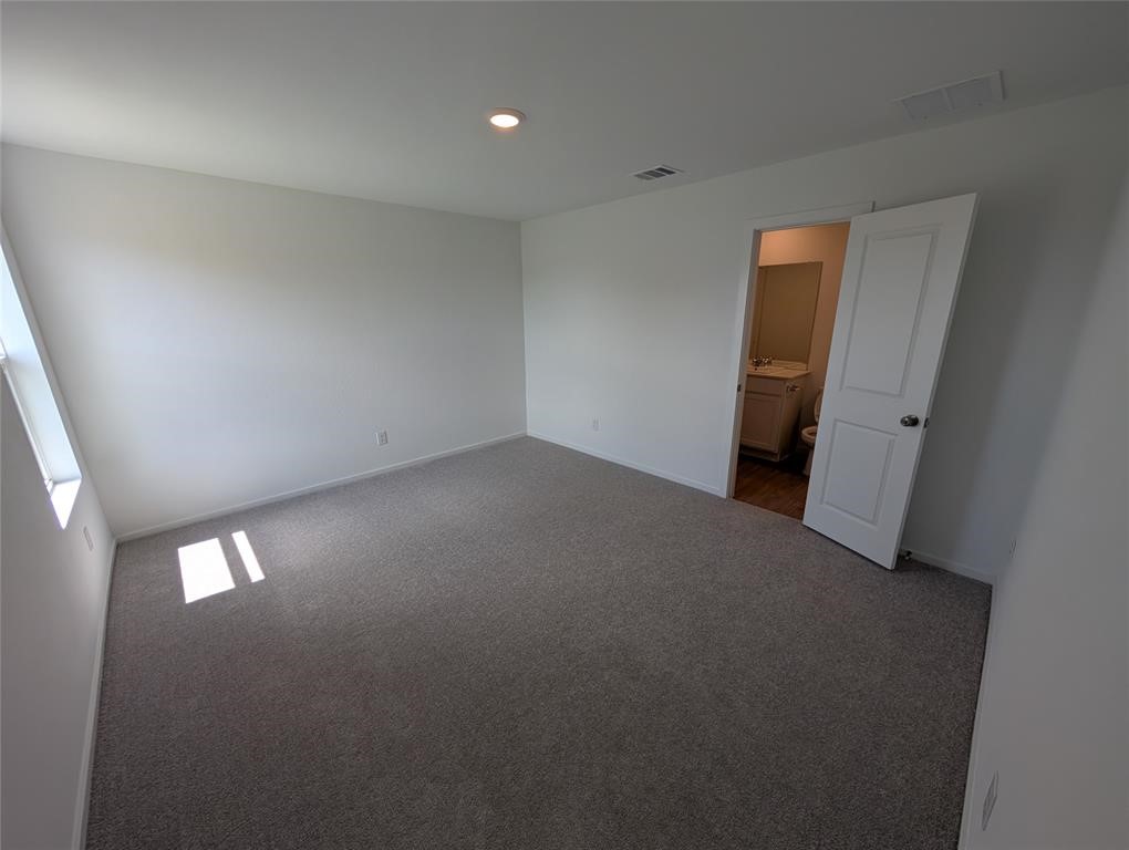 654 Maria Elena Way Cleveland, TX 77327 - Photo 9 of 23 a view of empty room