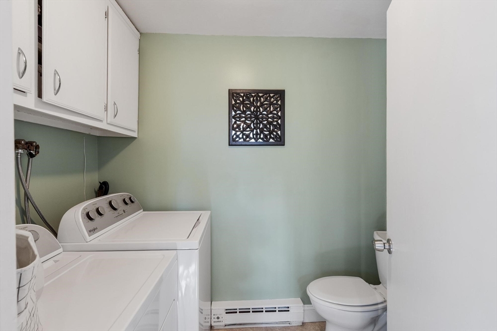 75 Sandy Pond Road, Unit 41 Ayer, MA 01432 - Photo 16 of 36 a bathroom with a toilet and a sink