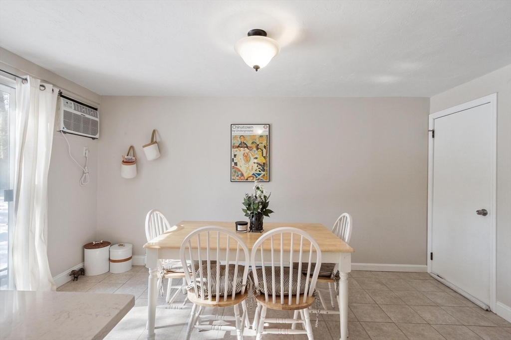 75 Sandy Pond Road, Unit 41 Ayer, MA 01432 - Photo 21 of 36 a view of a dining room with furniture