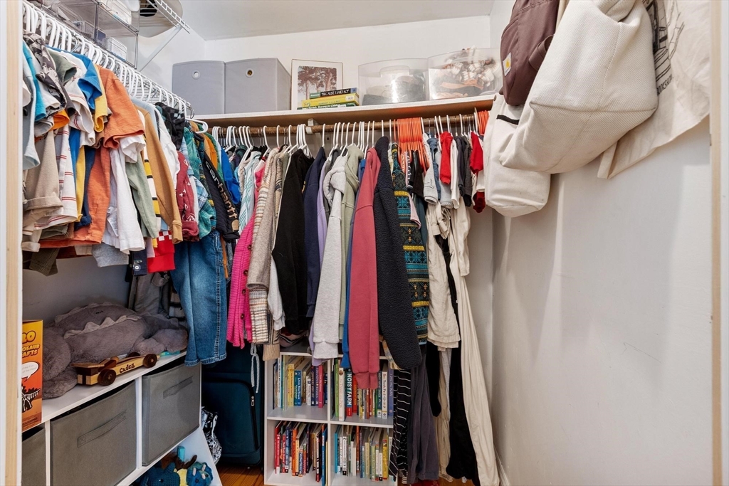75 Sandy Pond Road, Unit 41 Ayer, MA 01432 - Photo 30 of 36 a view of walk in closet with clothes