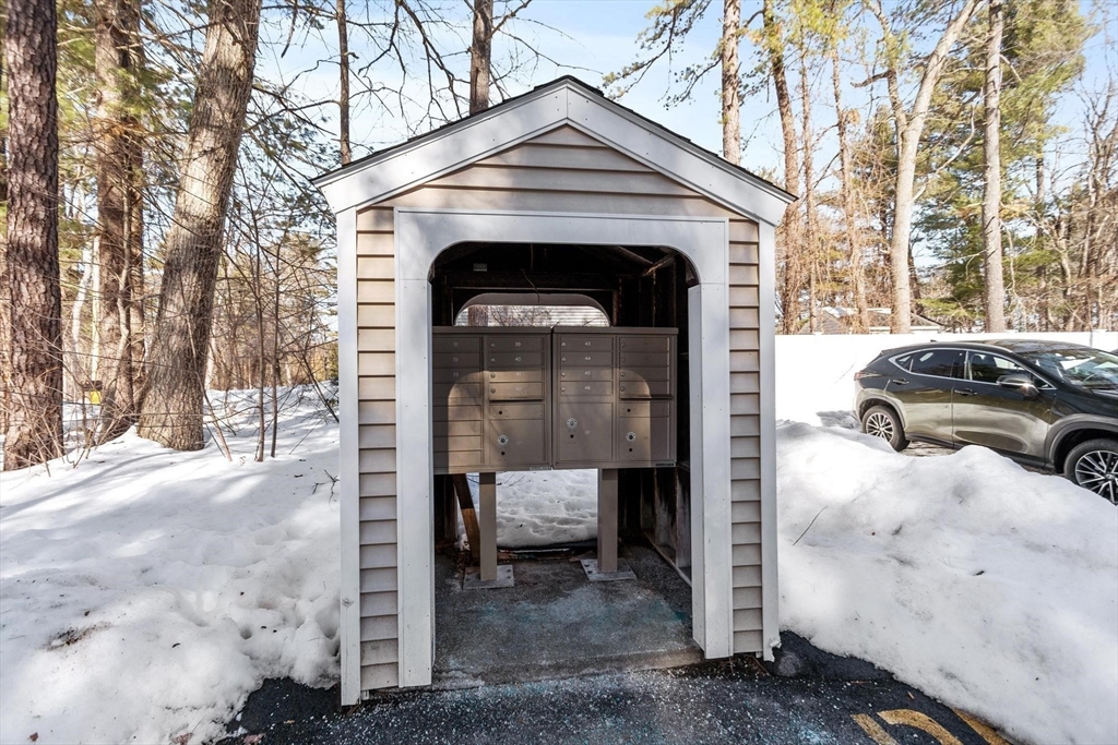 75 Sandy Pond Road, Unit 41 Ayer, MA 01432 - Photo 36 of 36 a view of entrance gate of a house