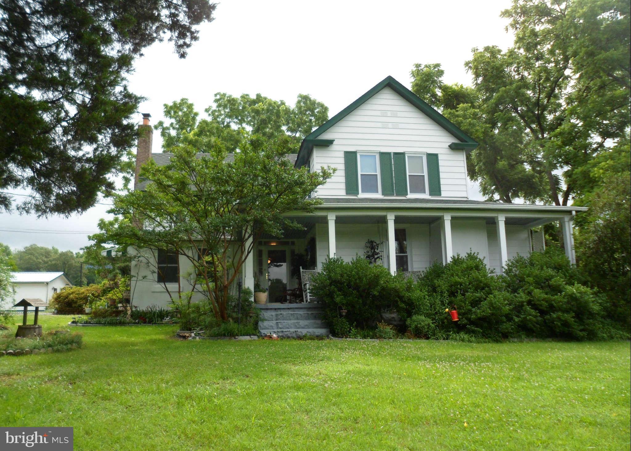 2990 Sixes Road Prince Frederick, MD 20678 - Photo 1 of 30 a view of a house with garden and yard