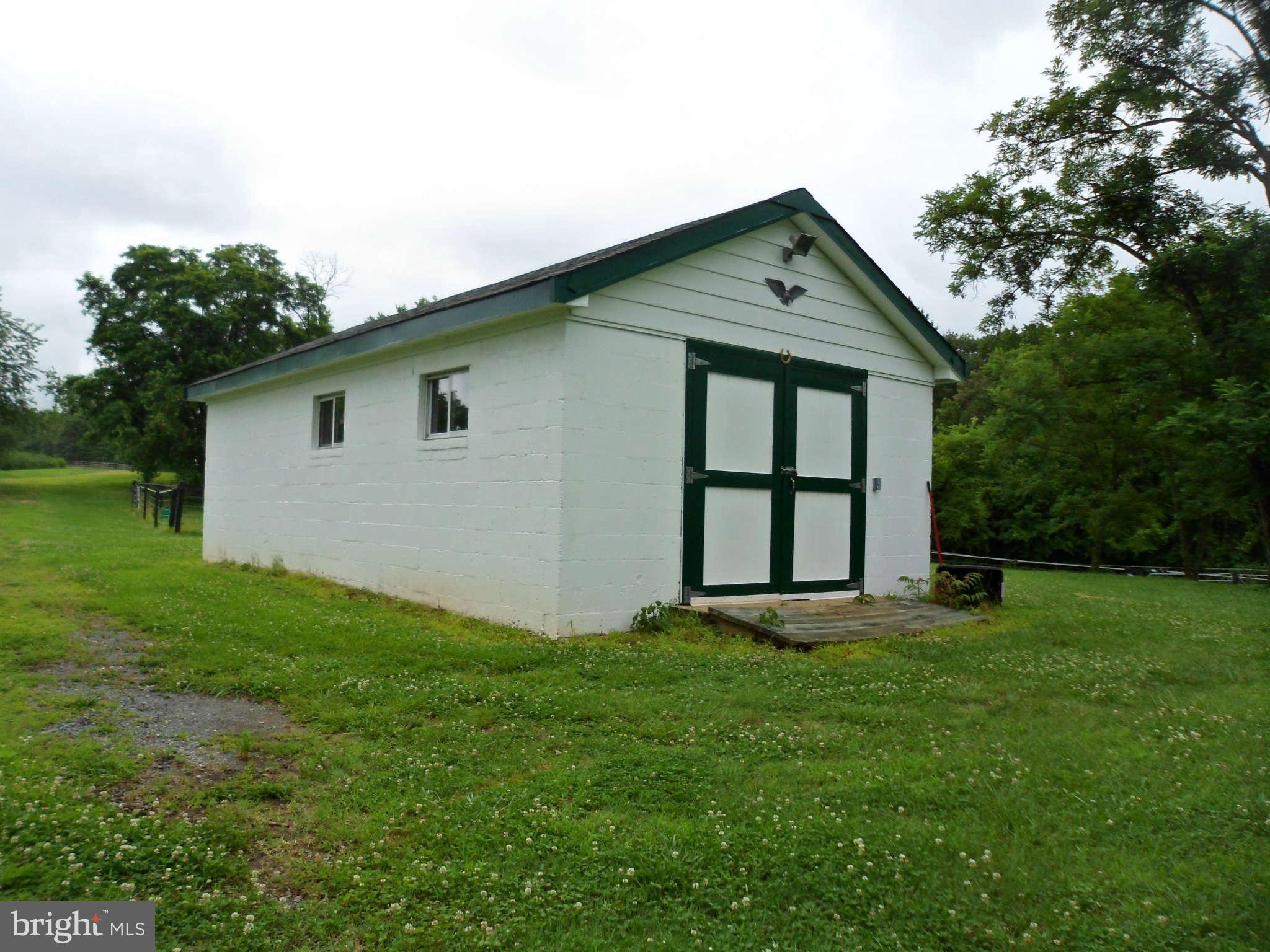 2990 Sixes Road Prince Frederick, MD 20678 - Photo 12 of 30 a front view of a house with a yard