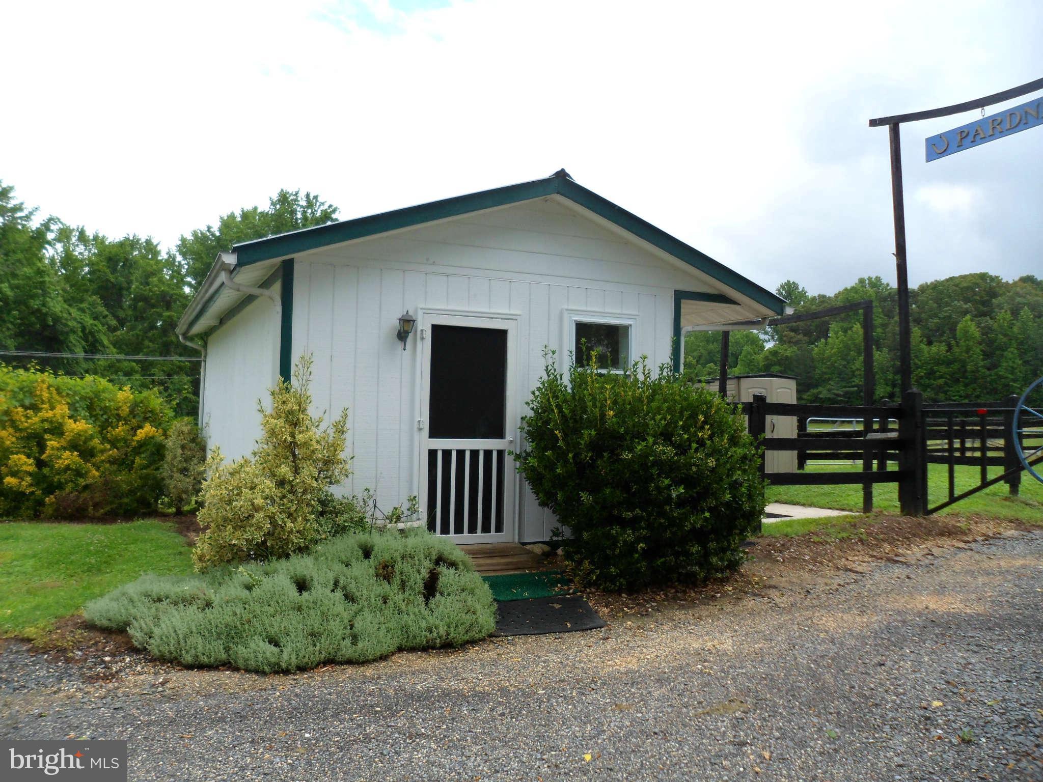 2990 Sixes Road Prince Frederick, MD 20678 - Photo 15 of 30 a front view of house with yard and green space