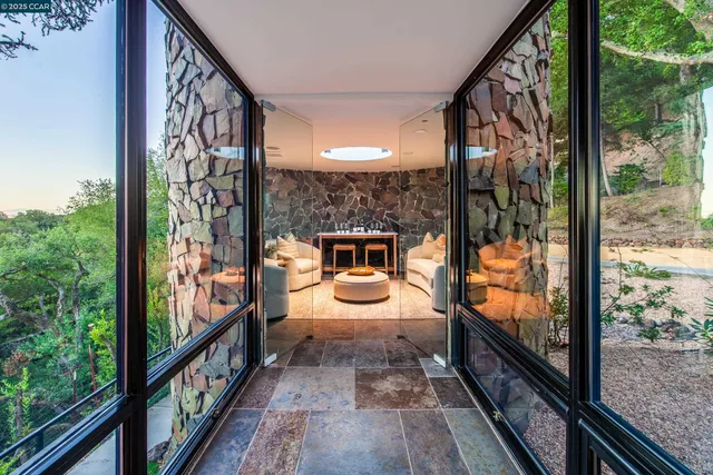 a view of a porch with wooden floor and outdoor space