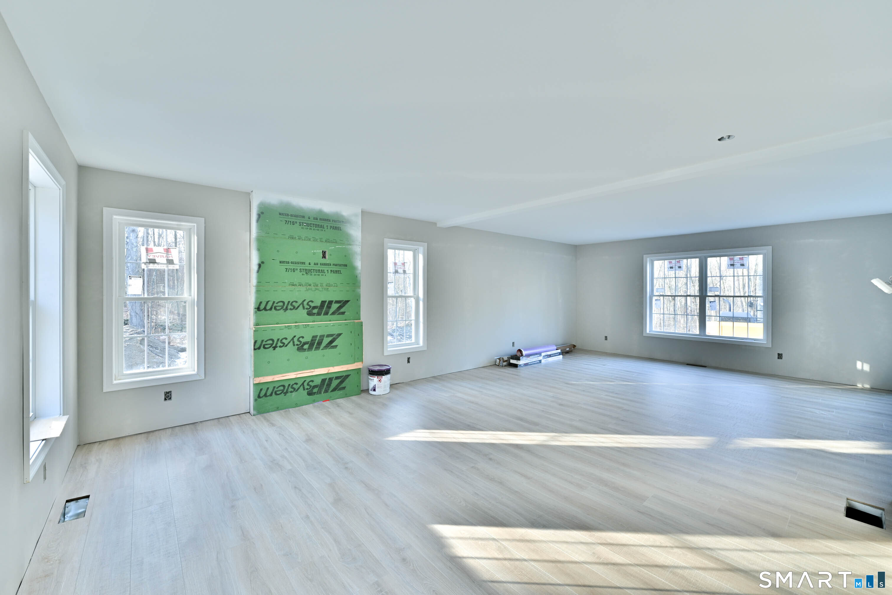 401 Tripp Hollow Road Canterbury, CT 06331 - Photo 11 of 39 an empty room with windows