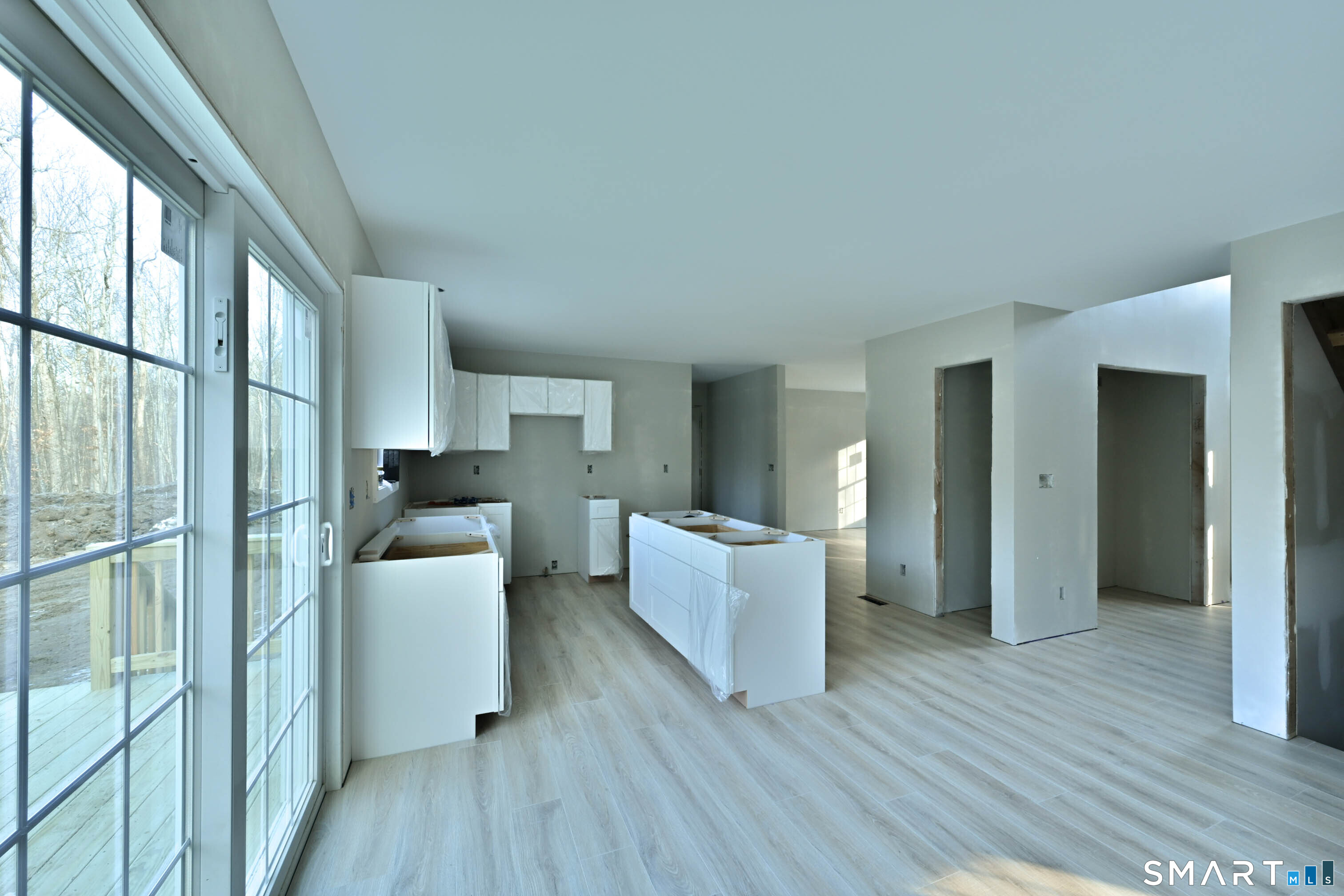 401 Tripp Hollow Road Canterbury, CT 06331 - Photo 15 of 39 wooden floor and windows in a room