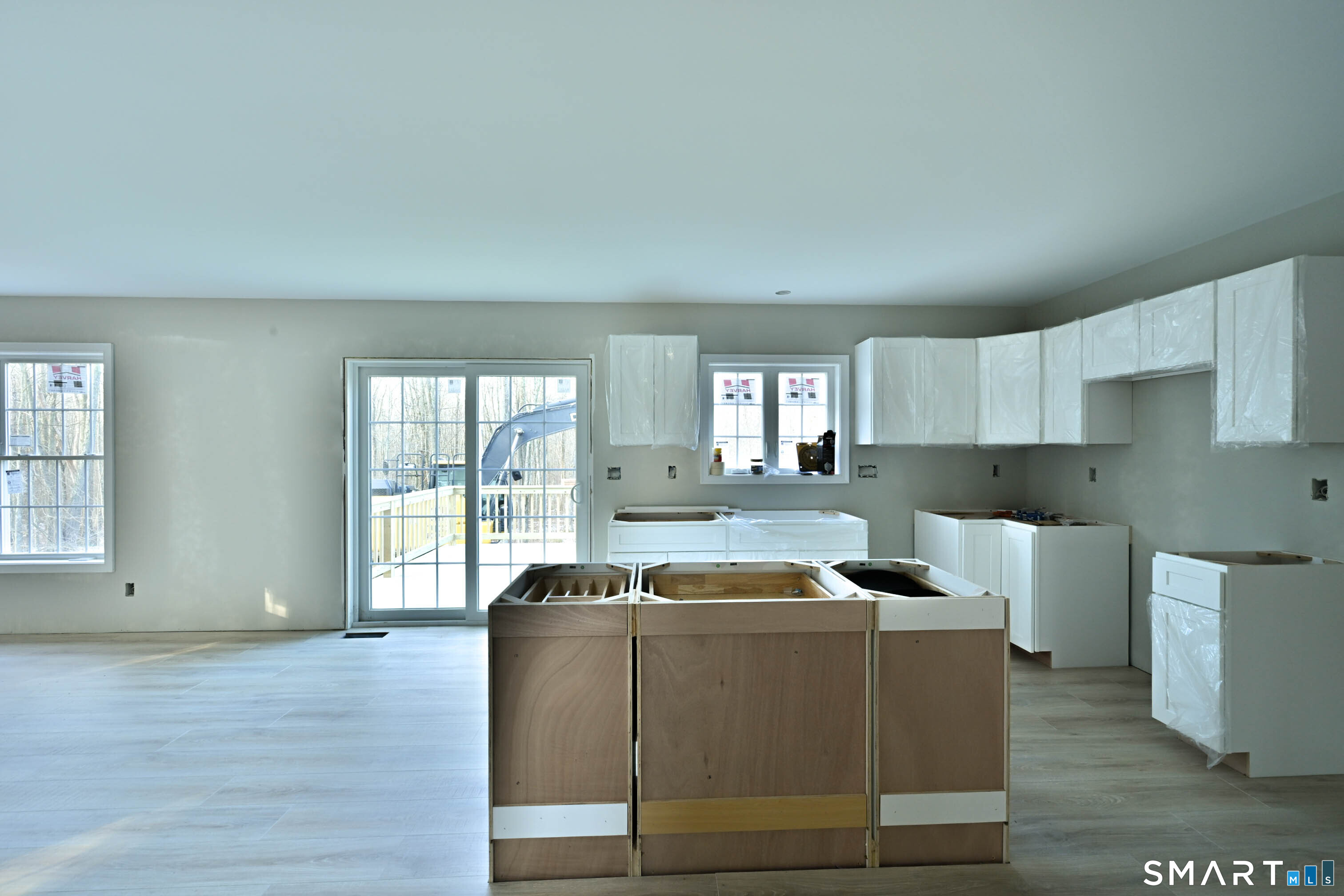 401 Tripp Hollow Road Canterbury, CT 06331 - Photo 18 of 39 a living room with furniture a window and wooden floors