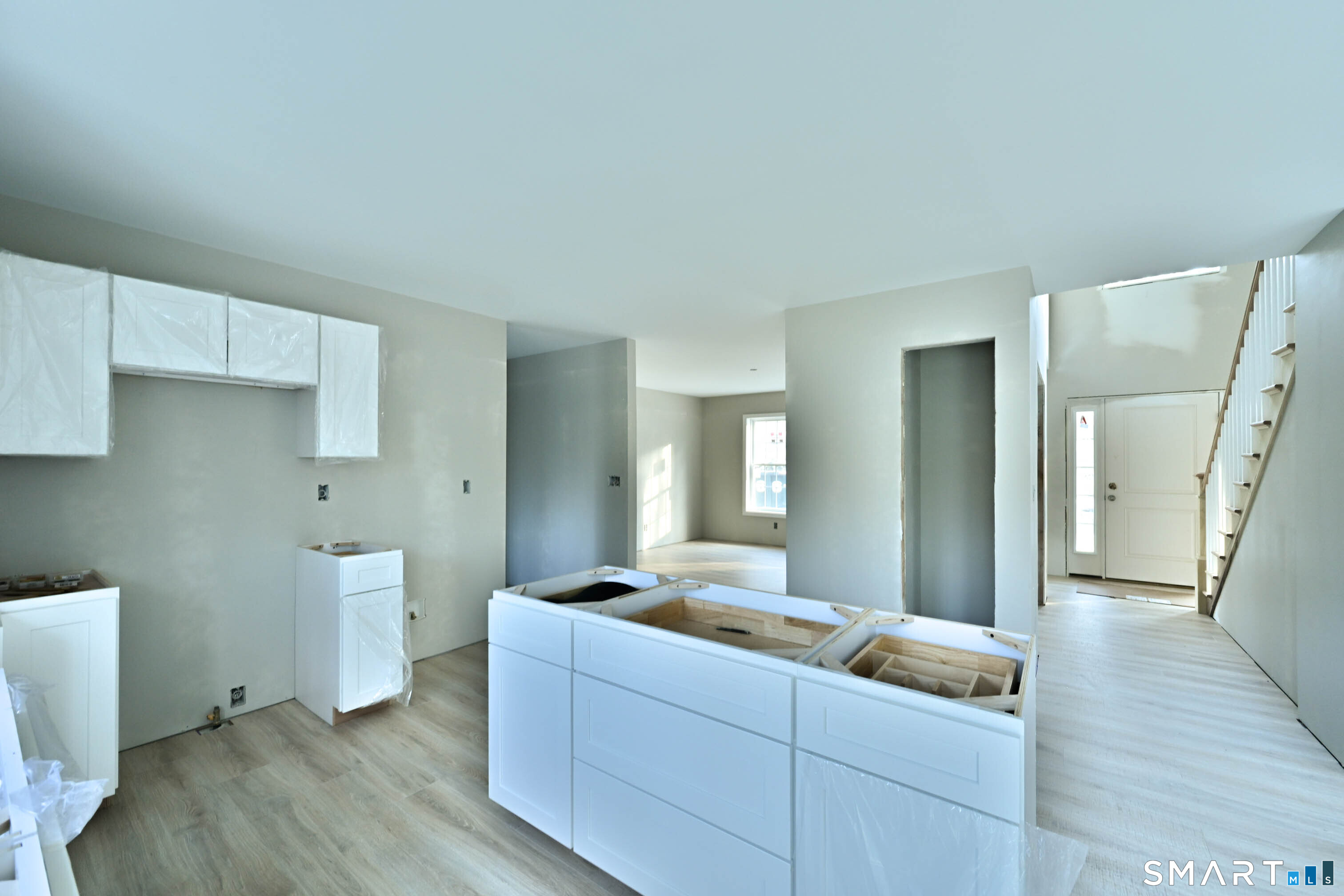 401 Tripp Hollow Road Canterbury, CT 06331 - Photo 21 of 39 a living room with furniture and a wooden floor