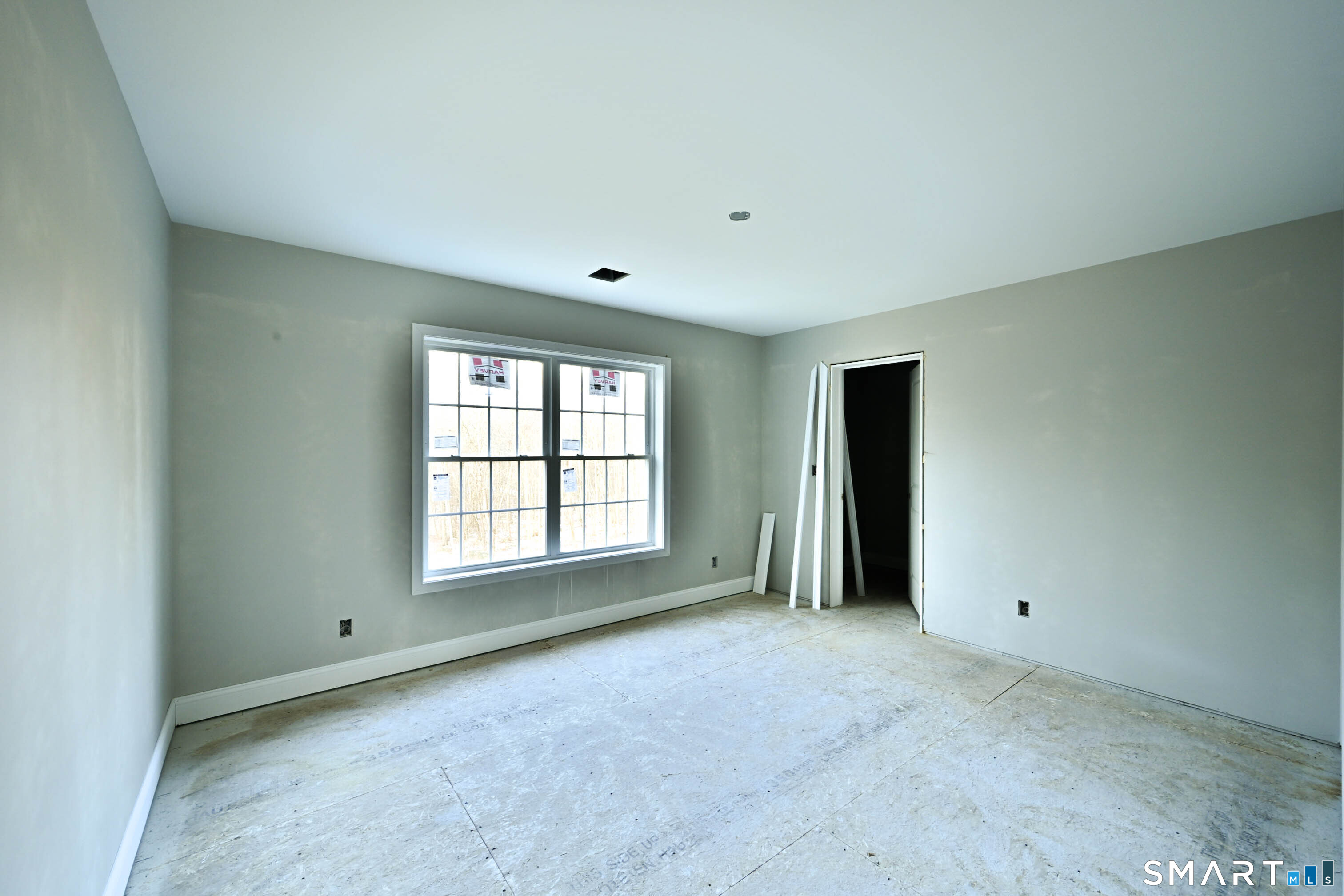 401 Tripp Hollow Road Canterbury, CT 06331 - Photo 34 of 39 a view of an empty room with a window