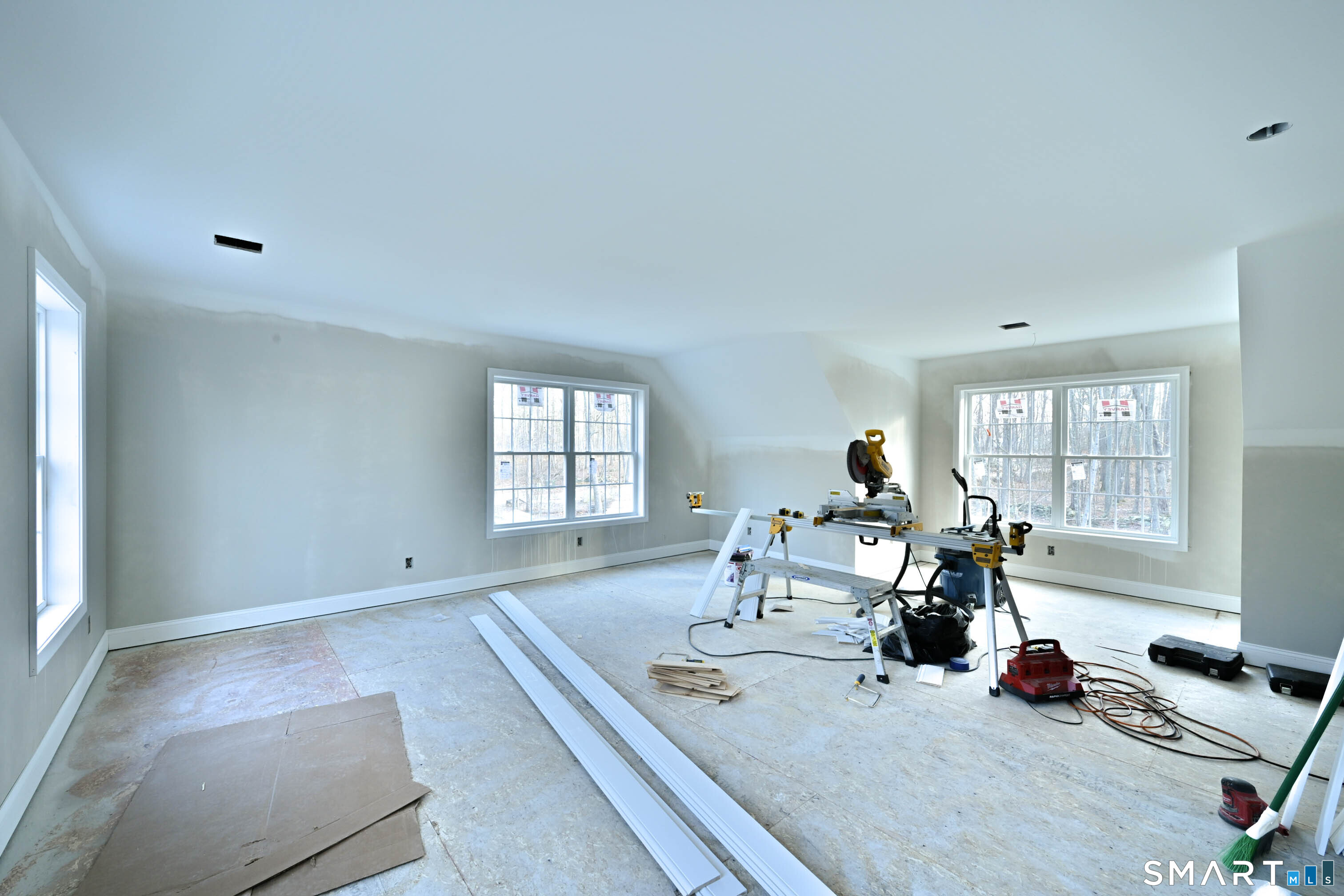 401 Tripp Hollow Road Canterbury, CT 06331 - Photo 36 of 39 a living room with furniture and a window