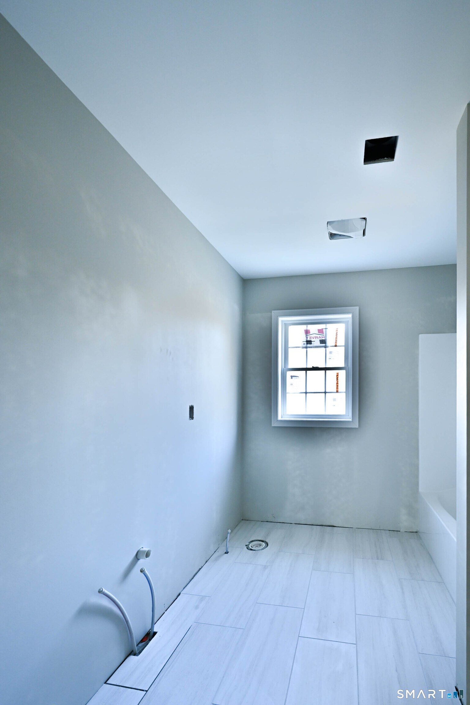 401 Tripp Hollow Road Canterbury, CT 06331 - Photo 39 of 39 an empty room with windows