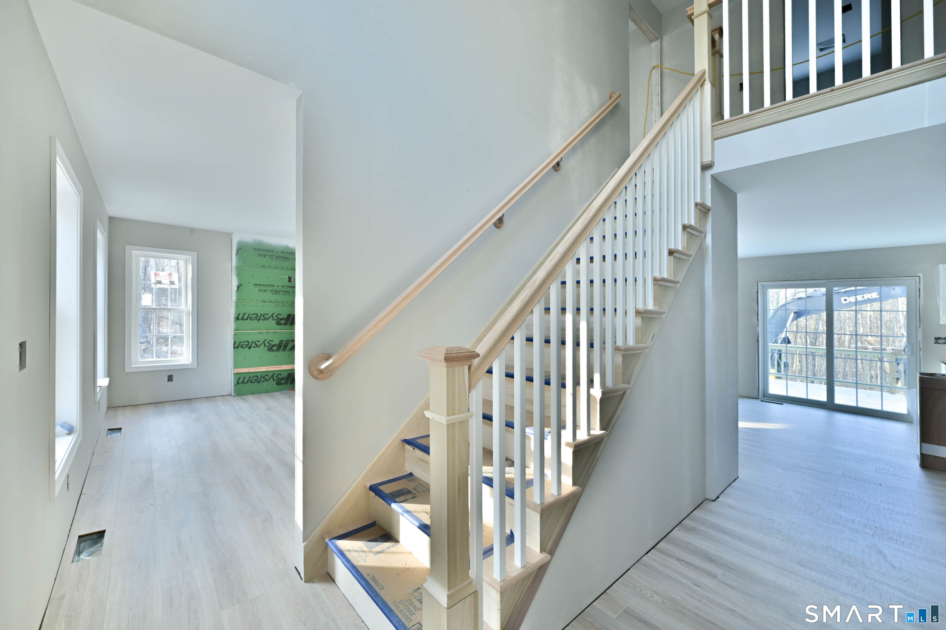 401 Tripp Hollow Road Canterbury, CT 06331 - Photo 9 of 39 a view of a hallway with wooden floor and stairs
