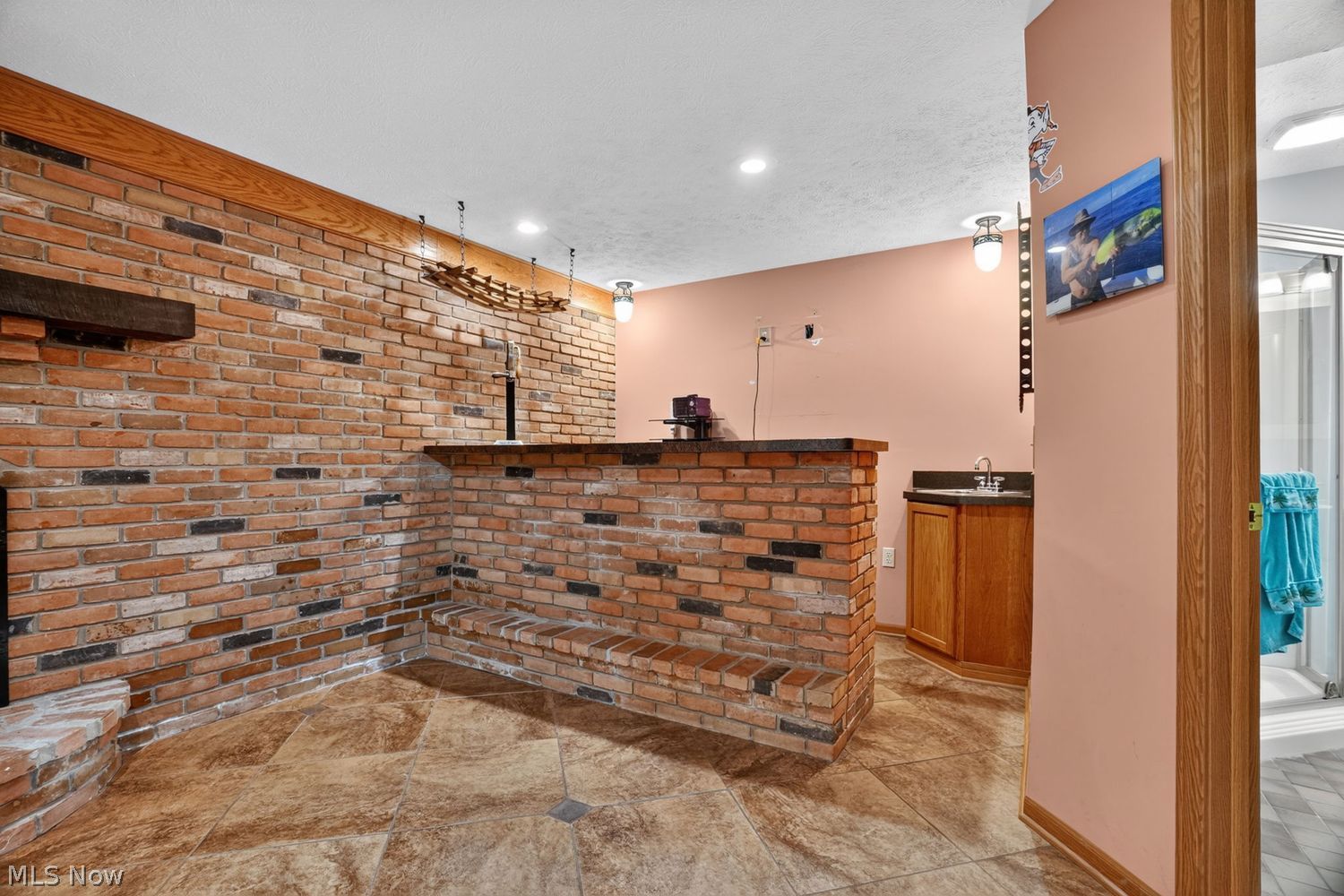 11190 West Walnut Ridge Road Chesterland, OH 44026 - Photo 36 of 49 Wet Bar with Storage Cabinetry