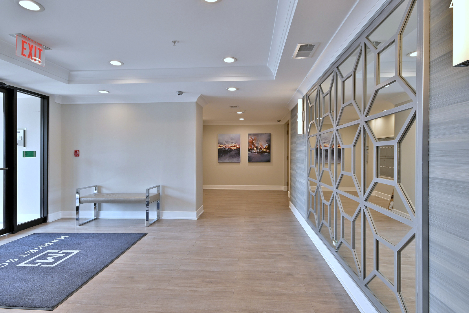 210 North Addison Avenue, Unit 301 Elmhurst, IL 60126 - Photo 8 of 30 a view of an entryway with wooden floor