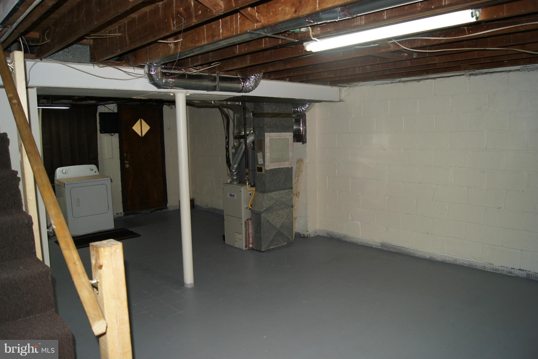 7954 Charlesmont Road Baltimore, MD 21222 - Photo 15 of 24 a view of water heater room