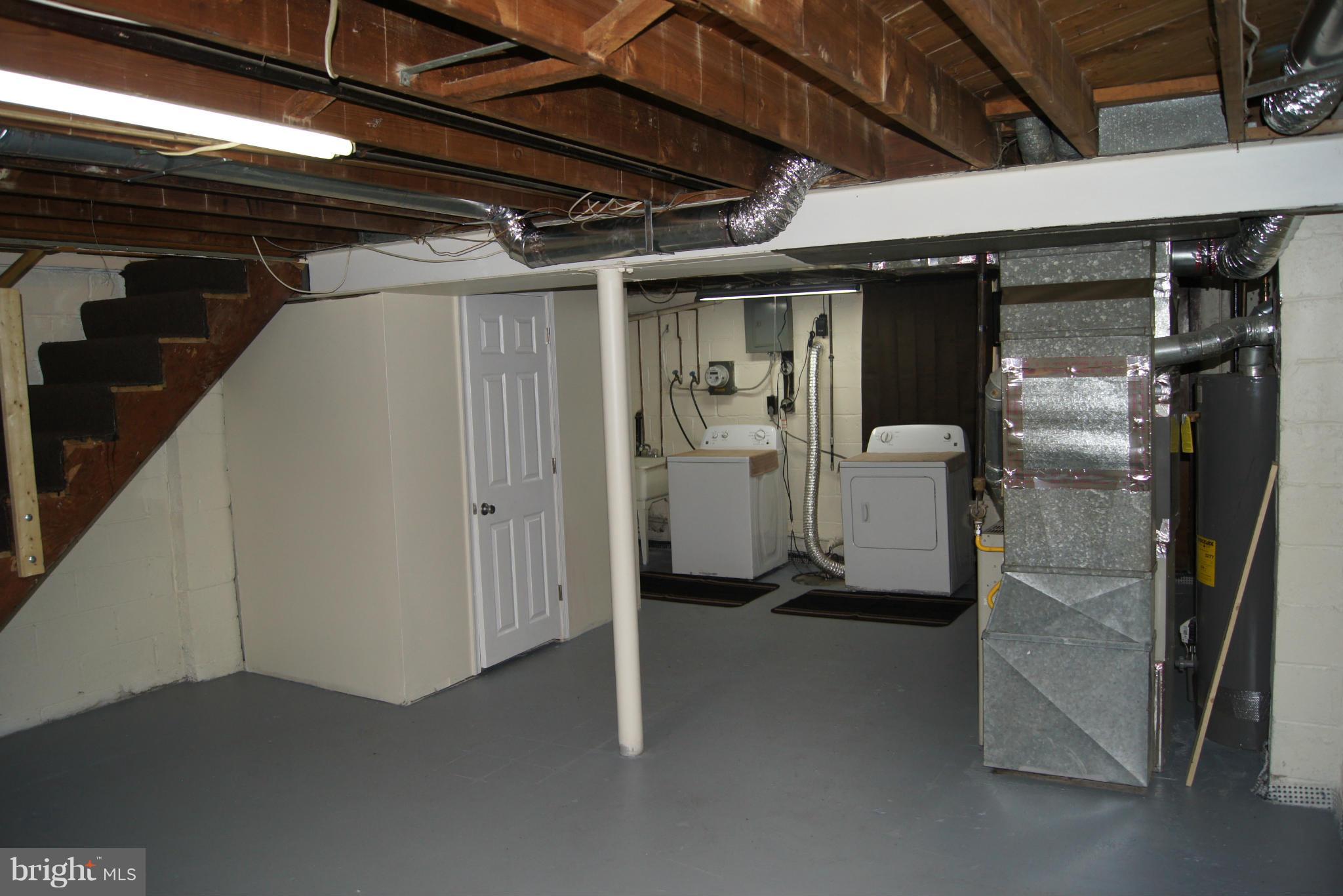 7954 Charlesmont Road Baltimore, MD 21222 - Photo 16 of 24 a view of water heater room
