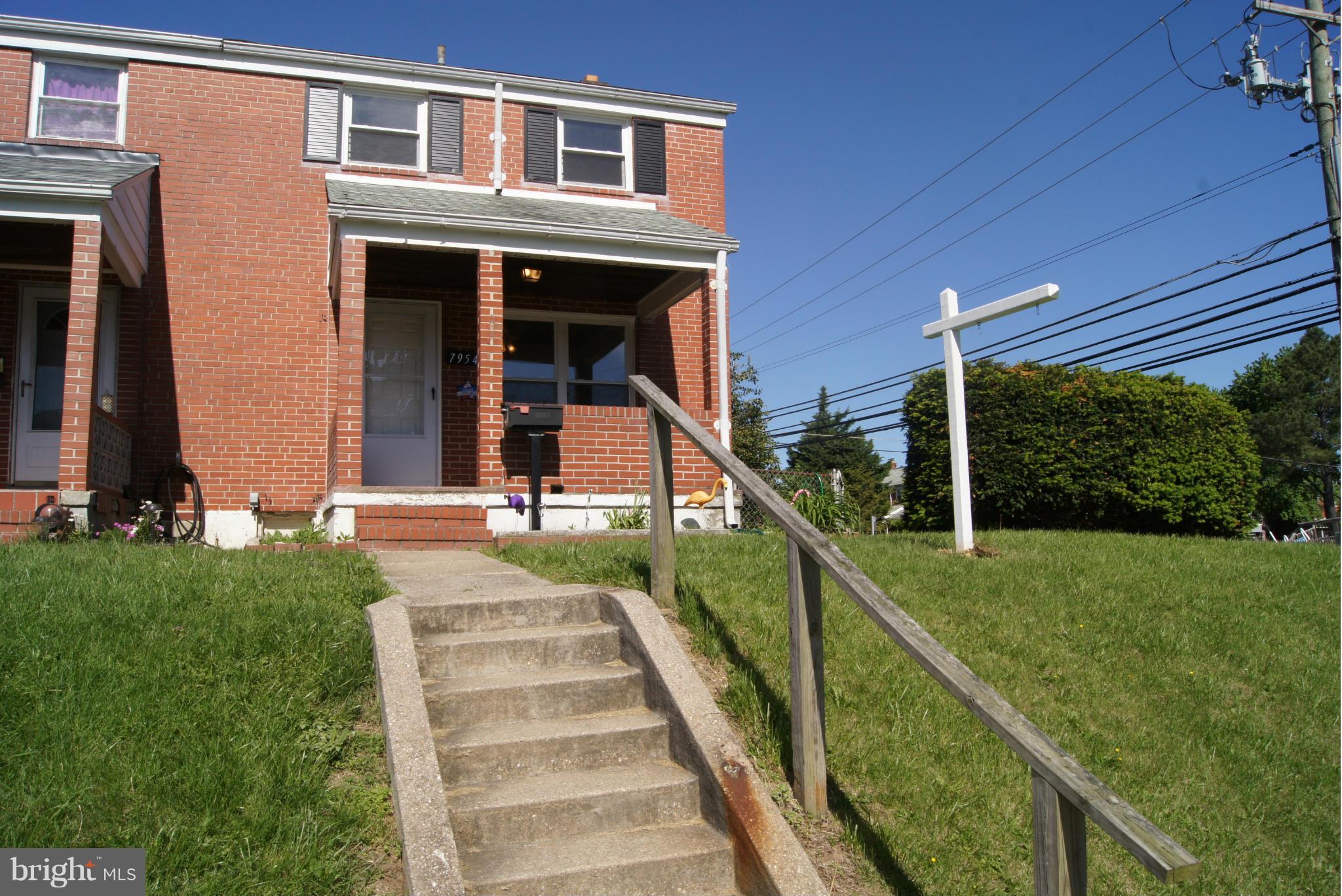 7954 Charlesmont Road Baltimore, MD 21222 - Photo 24 of 24 a view of a house with a yard