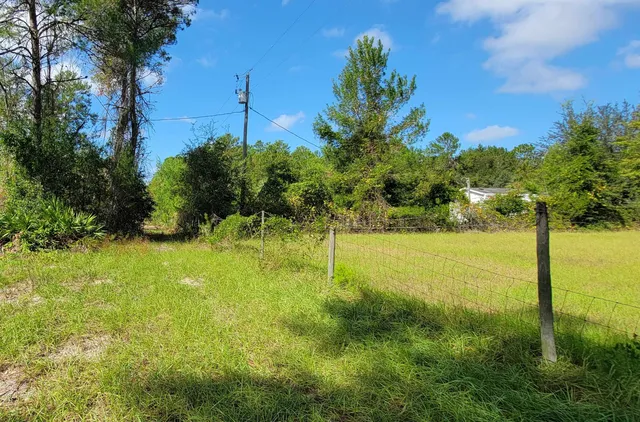 a view of an outdoor space and a yard