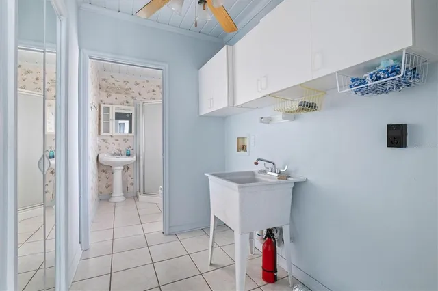 an aerial view of a house with yard swimming pool and outdoor seating