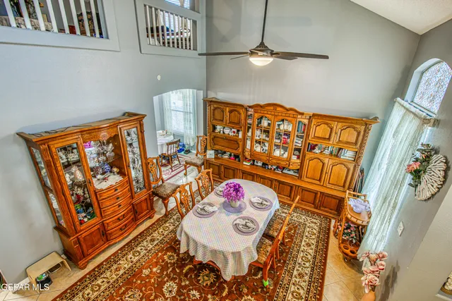 a bathroom with a sink vanity mirror and toilet
