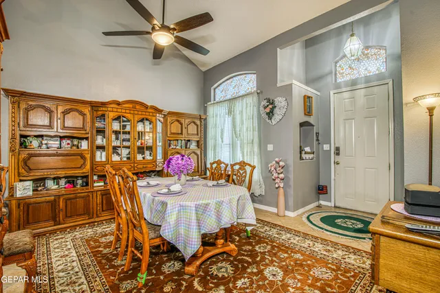 a kitchen with lots of counter top space and wooden floor