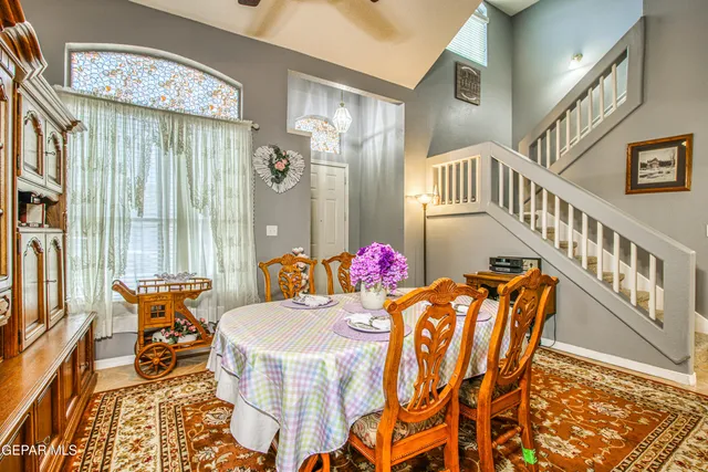 a kitchen with a stove a sink and a microwave