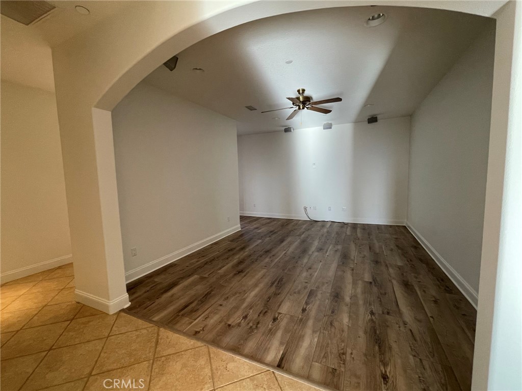 38975 Loftus Lane Temecula, CA 92592 - Photo 17 of 32 wooden floor in a hall with a window