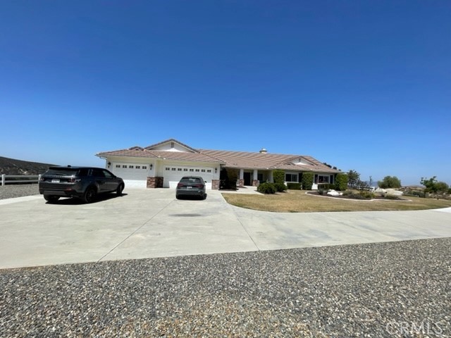 38975 Loftus Lane Temecula, CA 92592 - Photo 3 of 32 a view of a car parked in front of a house