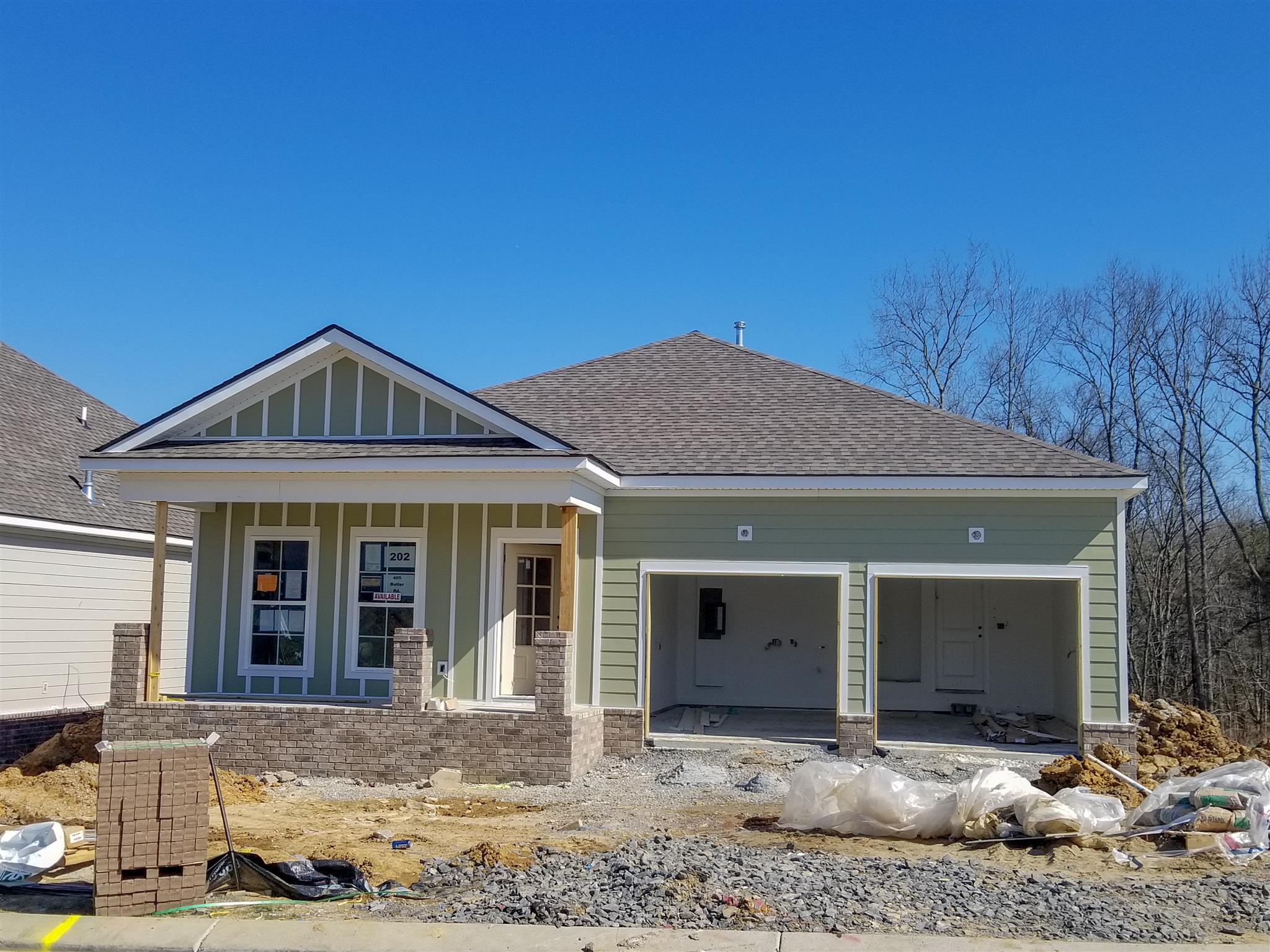 405 Butler Road Mount Juliet, TN 37122 - Photo 1 of 6 The Midland is positioned on a level lot with minimal steps into the home.