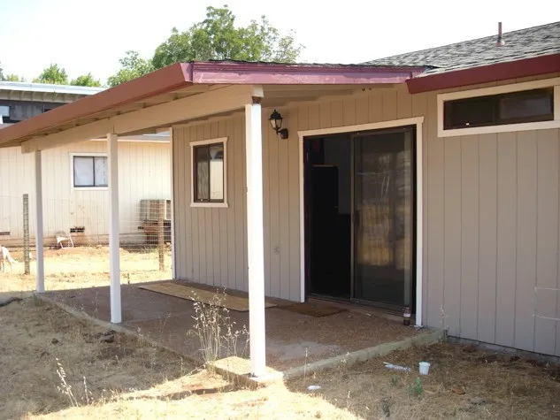 a view of a house with a patio