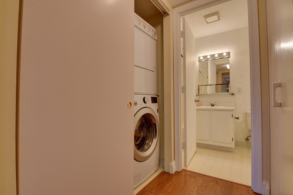 15 Bower Road, Unit A11 Quincy, MA 02169 - Photo 18 of 29 a utility room with dryer and washer