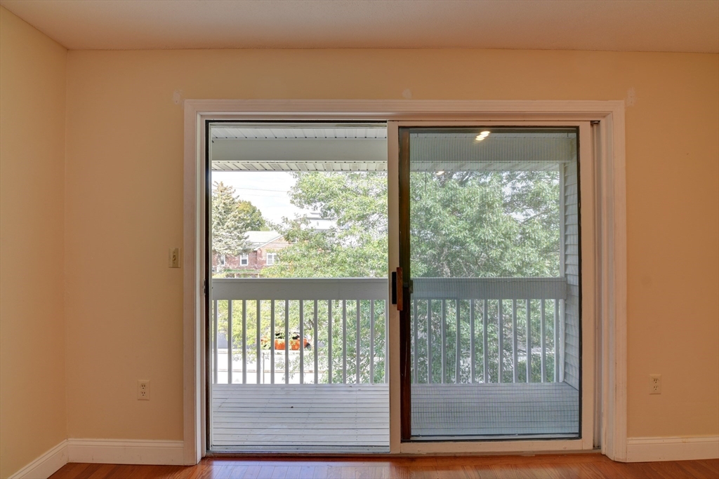 15 Bower Road, Unit A11 Quincy, MA 02169 - Photo 28 of 29 a view of a room that has a large window