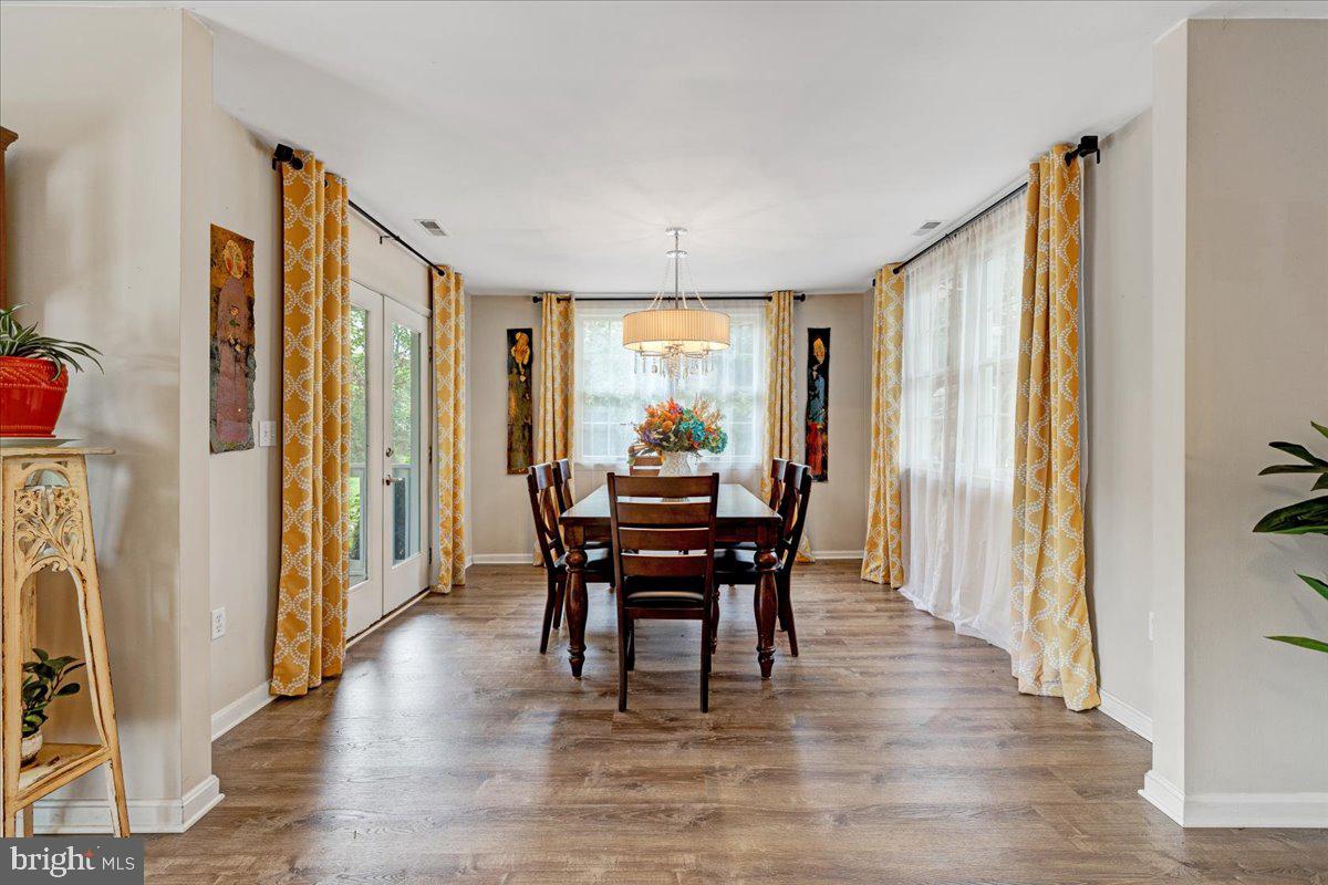 13228 Clipper Circle Solomons, MD 20688 - Photo 14 of 39 Large dining room with lots of windows
