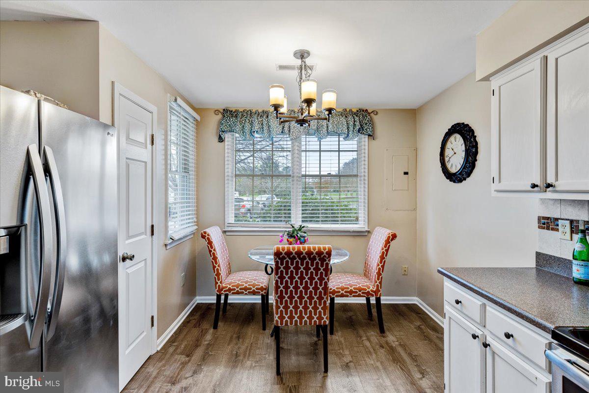 13228 Clipper Circle Solomons, MD 20688 - Photo 9 of 39 Cozy space to enjoy breakfast and there's a pantry