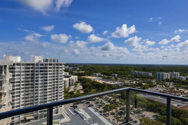a view of swimming pool with outdoor seating and plants