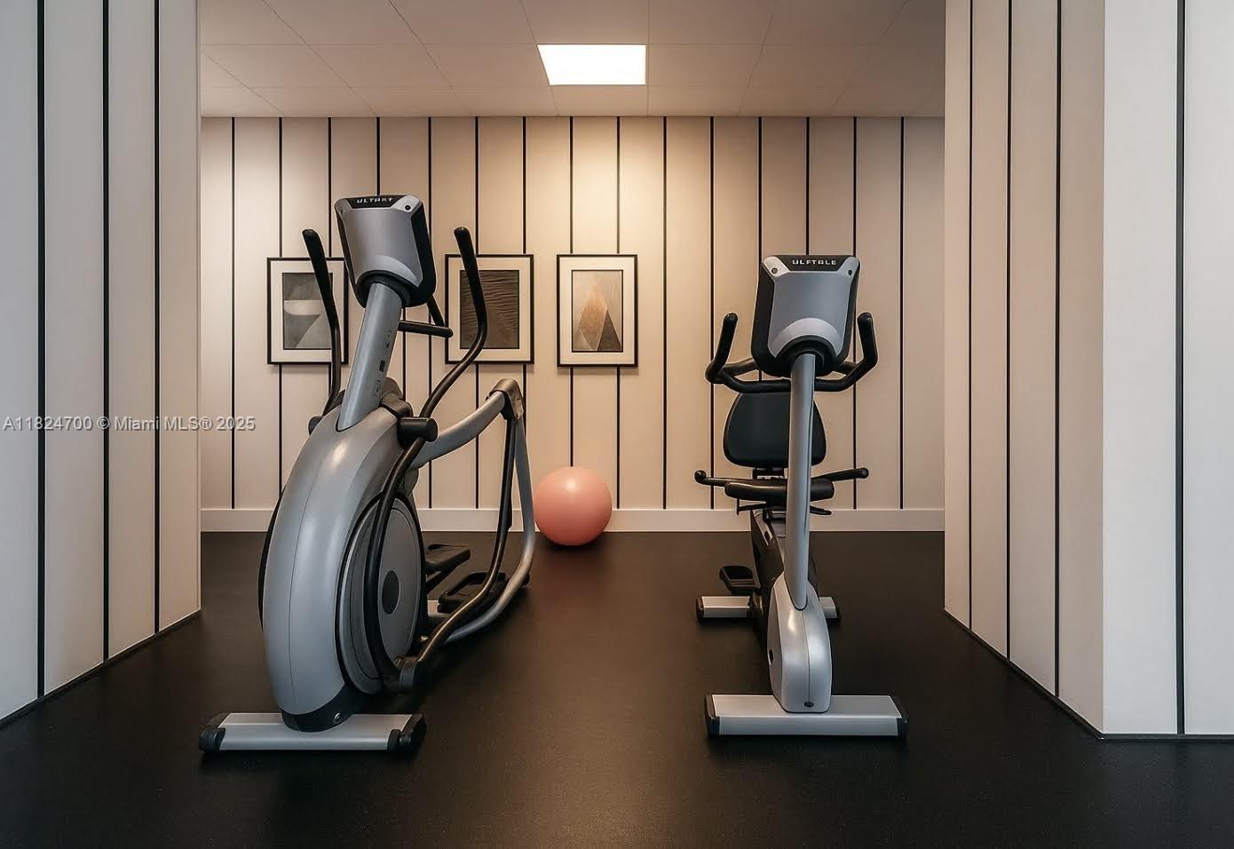 2750 Northeast 183rd Street, Unit 2103 Aventura, FL 33160 - Photo 24 of 30 a view of a room with gym equipment