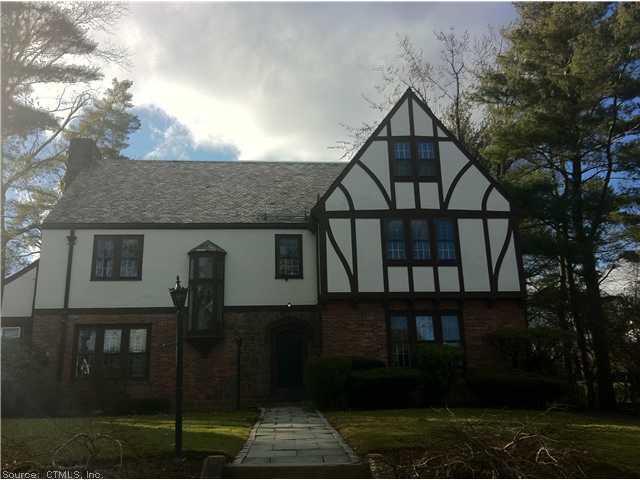 227 Terry Road Hartford, CT 06105 - Photo 1 of 1 a front view of a house with garden