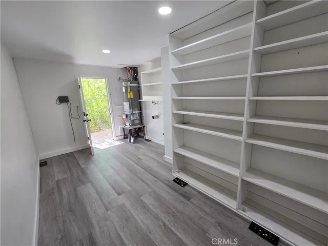 a view of a street with a building in the background