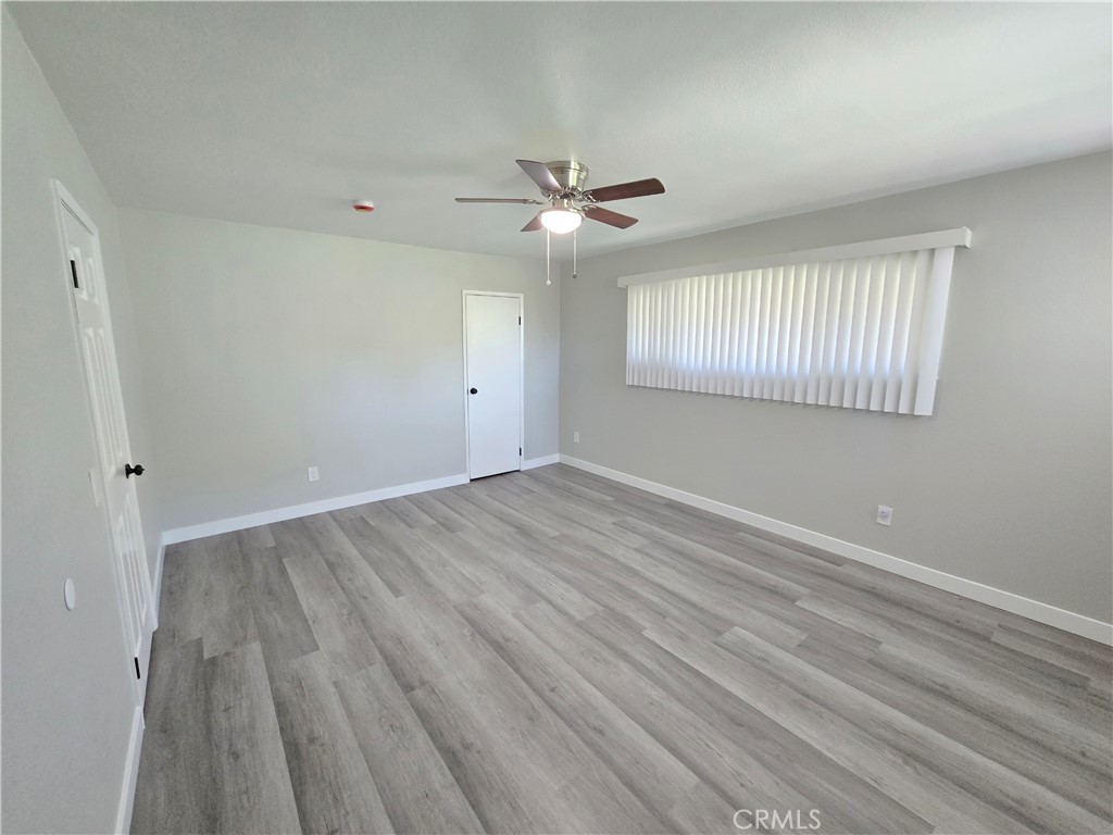 775 Libby Drive Riverside, CA 92507 - Photo 19 of 28 wooden floor in an empty room with a window