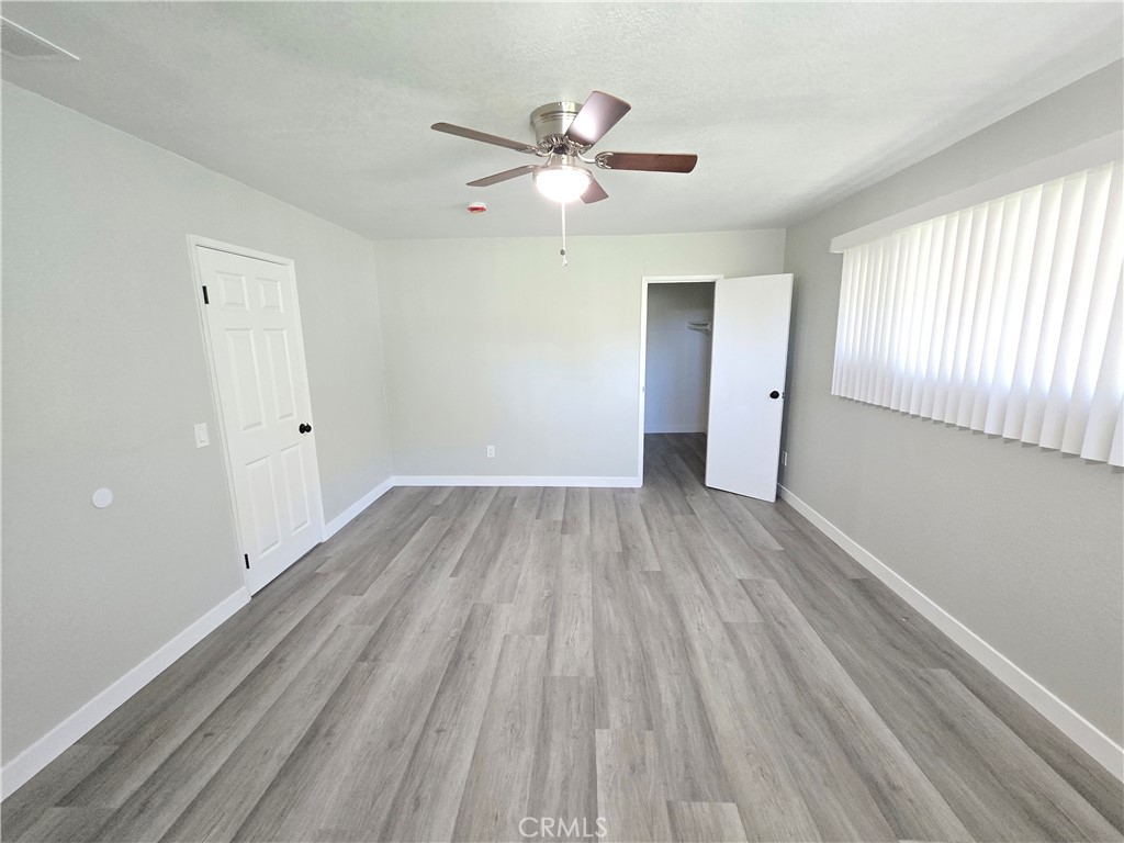 775 Libby Drive Riverside, CA 92507 - Photo 20 of 28 wooden floor in an empty room with a window